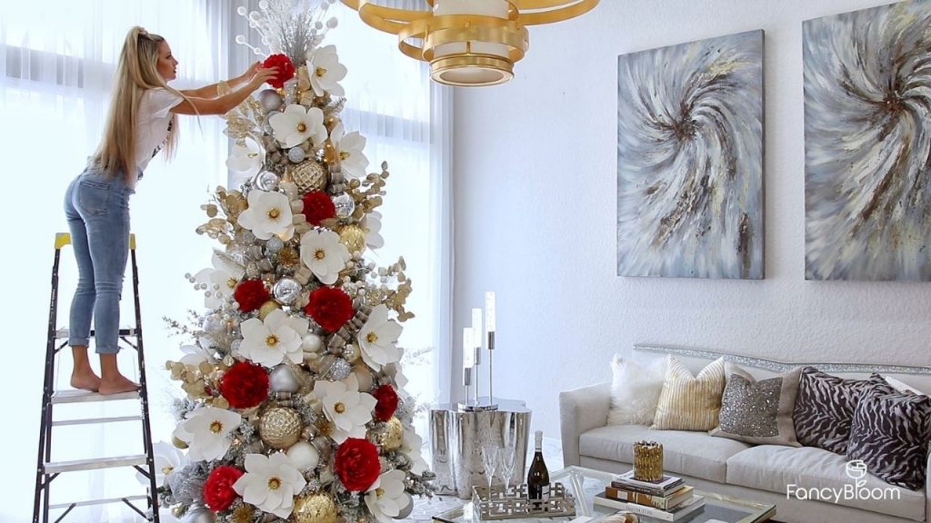 Christmas tree decorating with paper flowers